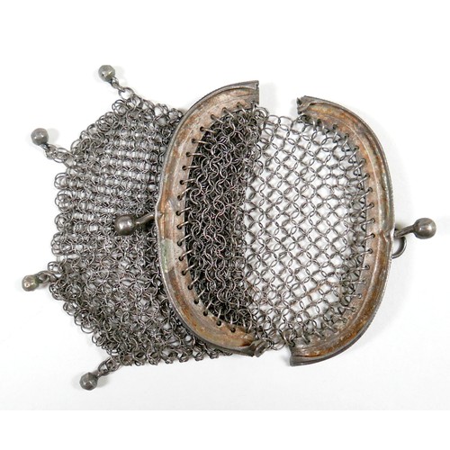 28 - Three bracelets and an opera purse, comprising a coin bracelet, and agate bracelet and a Chinese jad... 