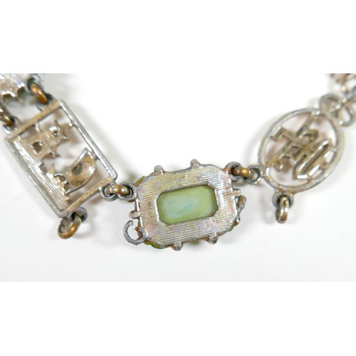 28 - Three bracelets and an opera purse, comprising a coin bracelet, and agate bracelet and a Chinese jad... 