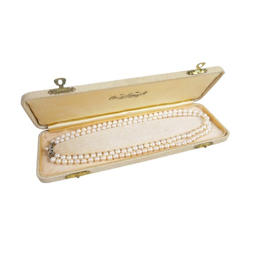 30 - A silver ingot pendant on chain, hallmarked, 40.4g, plus two pearl necklaces; single strand 14cm and... 