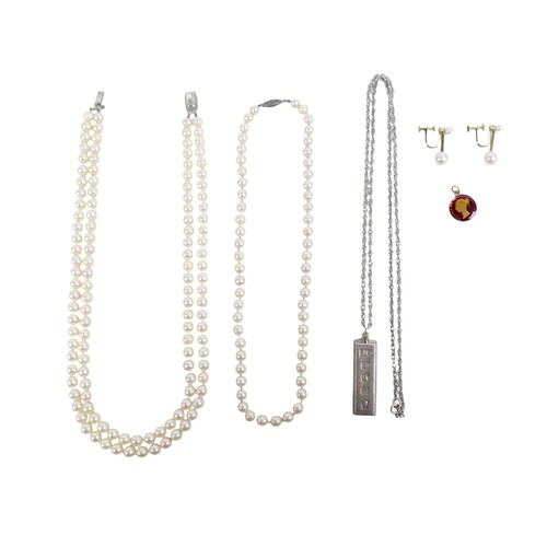 30 - A silver ingot pendant on chain, hallmarked, 40.4g, plus two pearl necklaces; single strand 14cm and... 
