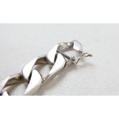 34 - An Italian Indaerre 925 sterling silver flat curb bracelet, 20cm, one side with textured detail, mar... 