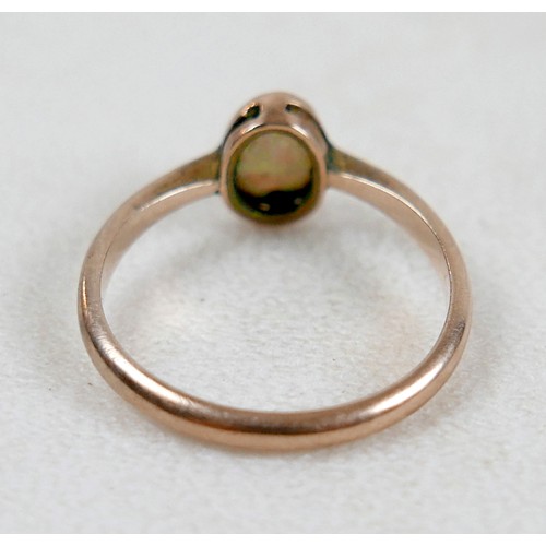36 - A opal ring with yellow metal band, size M, 1.7g, and a pair of diamond earrings, backs stamped 375,... 