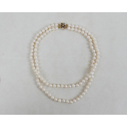 43 - A two-strand pearl necklace, with gold clasp and set with marquise sapphires, 36cm long, together wi... 