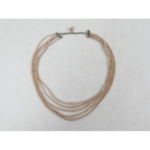 43 - A two-strand pearl necklace, with gold clasp and set with marquise sapphires, 36cm long, together wi... 