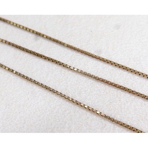 46 - A 9ct gold thin chain necklace, 58cm, 4.5g, plus an unmarked gold metal box chain necklace 1.6g (tot... 