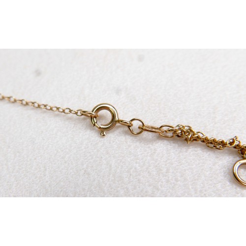 46 - A 9ct gold thin chain necklace, 58cm, 4.5g, plus an unmarked gold metal box chain necklace 1.6g (tot... 