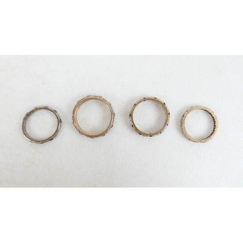 49 - Four rings, to include two 9ct diamond and sapphire eternity rings, size N, 2.7g and 2.8g, plus unma... 