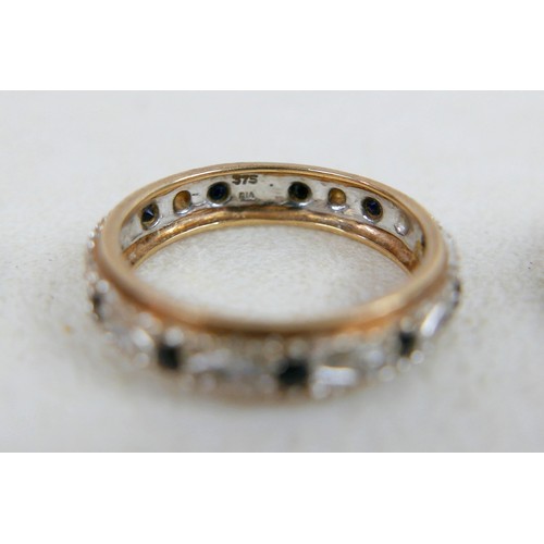 49 - Four rings, to include two 9ct diamond and sapphire eternity rings, size N, 2.7g and 2.8g, plus unma... 