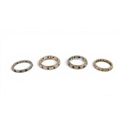 49 - Four rings, to include two 9ct diamond and sapphire eternity rings, size N, 2.7g and 2.8g, plus unma... 