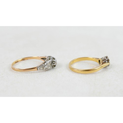 50 - Two 18ct and diamond rings; the first a solitaire diamond with leaf shoulders, size P, 2.3g, the oth... 