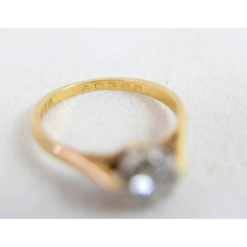 50 - Two 18ct and diamond rings; the first a solitaire diamond with leaf shoulders, size P, 2.3g, the oth... 