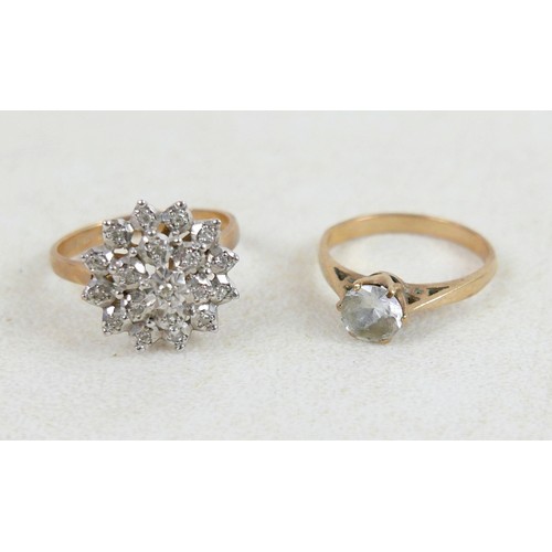 53 - Two 9ct gold rings; one a three tier diamond flowerhead ring, size Q, 3.7g, and one 9ct with single ... 