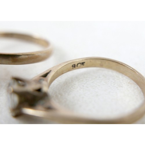 53 - Two 9ct gold rings; one a three tier diamond flowerhead ring, size Q, 3.7g, and one 9ct with single ... 