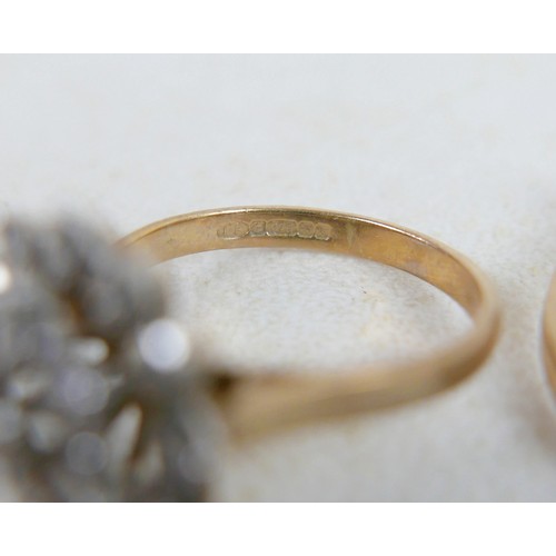 53 - Two 9ct gold rings; one a three tier diamond flowerhead ring, size Q, 3.7g, and one 9ct with single ... 