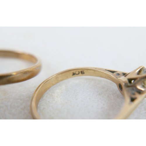 53 - Two 9ct gold rings; one a three tier diamond flowerhead ring, size Q, 3.7g, and one 9ct with single ... 