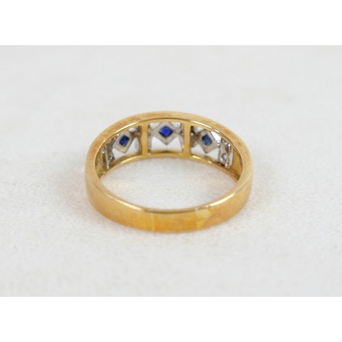 55 - An 18ct gold, sapphire and diamond ring wit three square cut sapphires alternating with diamonds in ... 