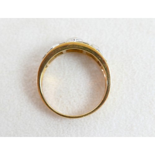 55 - An 18ct gold, sapphire and diamond ring wit three square cut sapphires alternating with diamonds in ... 