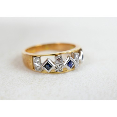 55 - An 18ct gold, sapphire and diamond ring wit three square cut sapphires alternating with diamonds in ... 