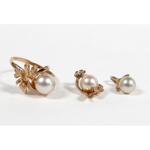 58 - A 14k gold and single pearl ring with flower detail, 3.3g, size P, plus a matching 10k gold and pear... 