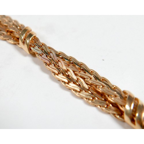 12 - An Italian 9ct Indoerre gold bracelet with two fancy interwoven chains, 20cm, 24.9g.