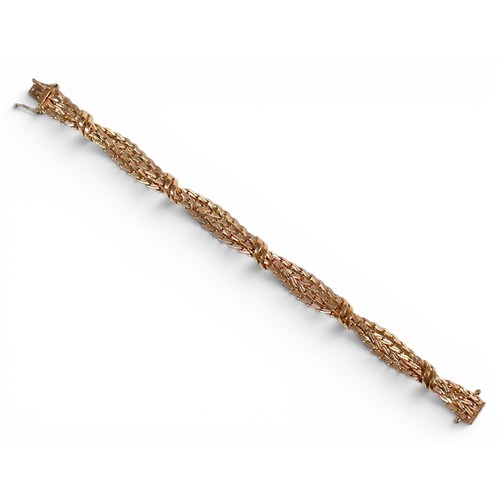 12 - An Italian 9ct Indoerre gold bracelet with two fancy interwoven chains, 20cm, 24.9g.
