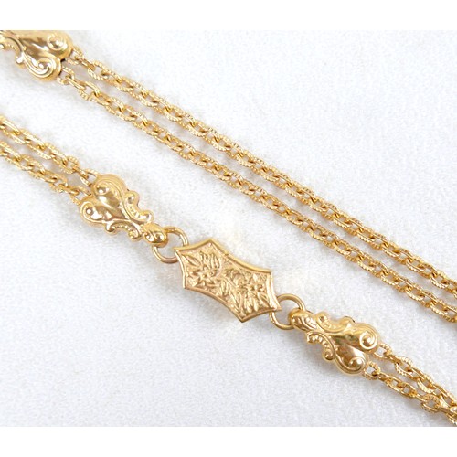 11 - A 9ct gold double chain necklace with lobster clasps, heart and wholly leaf shaped sections, tassel ... 