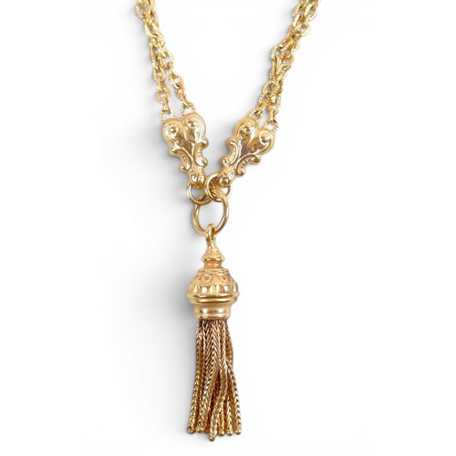 11 - A 9ct gold double chain necklace with lobster clasps, heart and wholly leaf shaped sections, tassel ... 