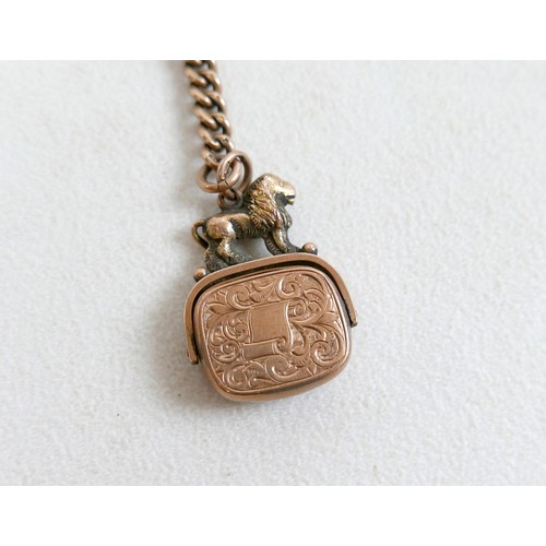7 - A 9ct gold fob chain with T bar, Y shape as necklace, 45cm, plus a red hard stone set 9ct rose gold ... 