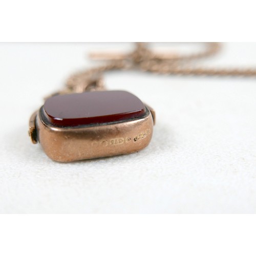 7 - A 9ct gold fob chain with T bar, Y shape as necklace, 45cm, plus a red hard stone set 9ct rose gold ... 
