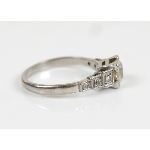 4 - An Art Deco diamond ring, the central stone approxmately 0.8ct old European/old mine cut in square s... 