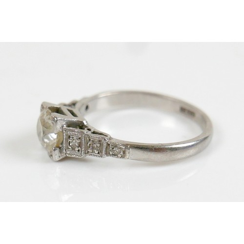 4 - An Art Deco diamond ring, the central stone approxmately 0.8ct old European/old mine cut in square s... 