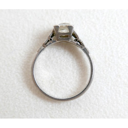 4 - An Art Deco diamond ring, the central stone approxmately 0.8ct old European/old mine cut in square s... 