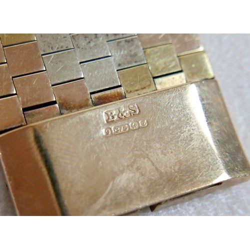 2 - A 9ct three color gold flat brick bracelet, with sections of yellow, rose and white gold, maker B&S,... 