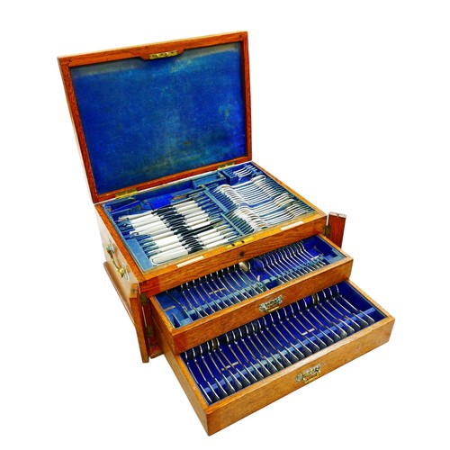 A George V canteen of silver cutlery, including 75 pieces Goldsmiths & Silversmiths Co Ltd. London 1925, together with other Silversmiths Co Ltd. London cutlery with other date marks, including a large sauce ladle, 1924, and serving spoon, 1902, six teaspoons, 1921, two small sauce ladles, 1923, sugar tongs, 1917, condiment spoon, 1915, approximately 144toz, as well as 24 Arthur Price ivorine handled butter knives, the oak case canteen with three sections.