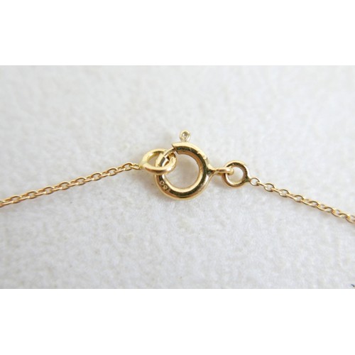 37A - An 18ct gold necklace with two hoop design on thin chain, 2.4g.