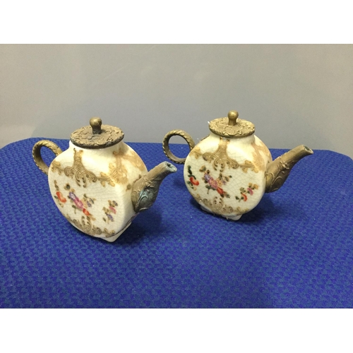 248 - 2 small oriental teapots