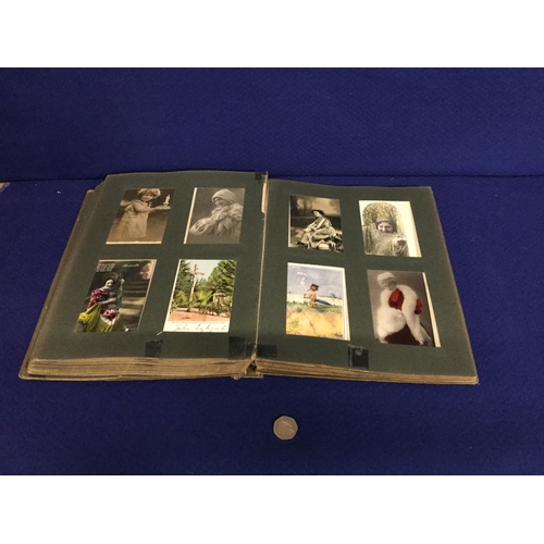 129 - Album of Victorian postcards