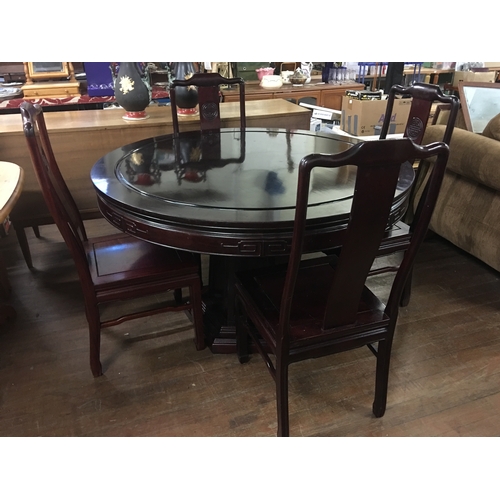 173 - Cherry wood oriental style dinning table and 4 chairs