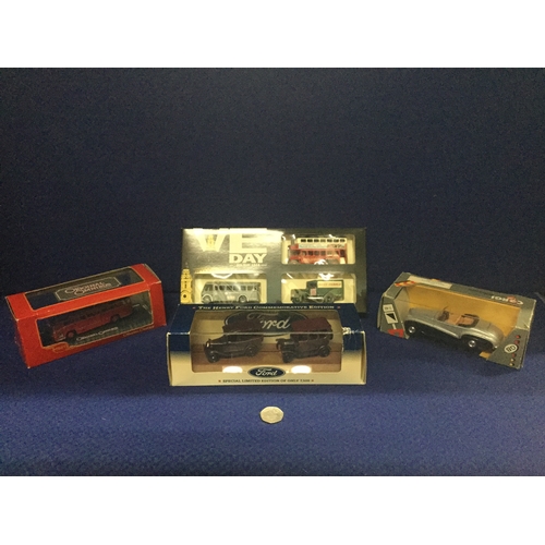 57 - 4 boxed model cars to include corgi