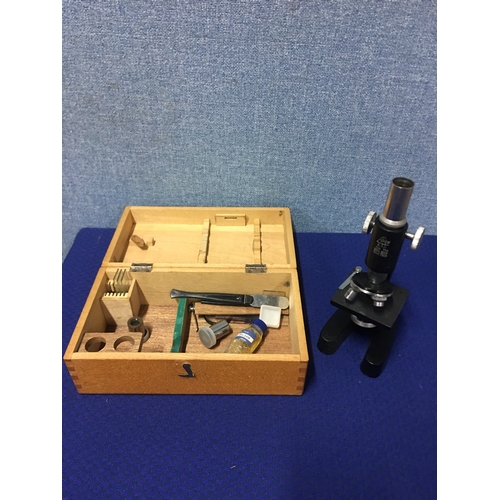 122 - Vintage microscope with wooden case