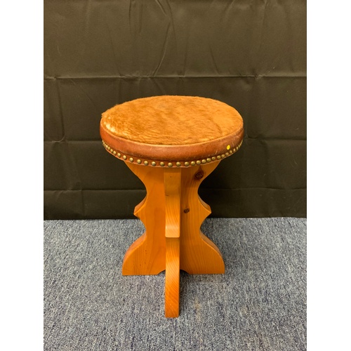 43 - Fur topped handmade stool on solid wood base.