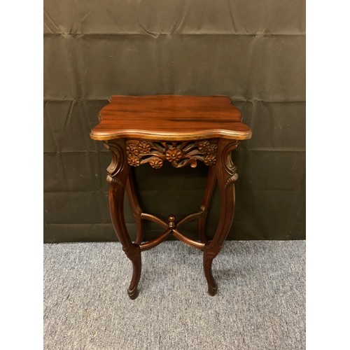 26 - Repro, carved oriental end table 75cm tall.