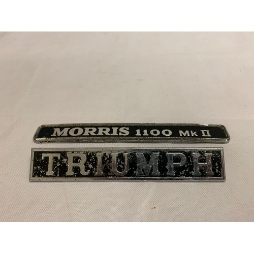 37 - Vintage Morris and Triumph car signs.