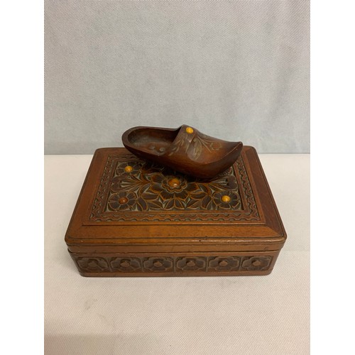 43 - Carved wooden box inlaid with amber stones and wooden clog with amber stone.