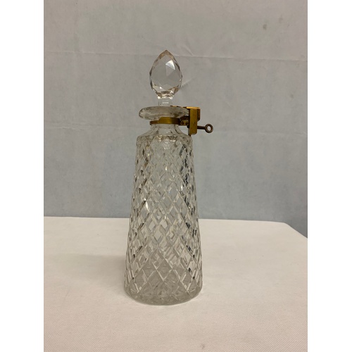 48 - 19th centuary Betjemann's crystal decanter with fitted lock. Lock engraved W.N.M From D.B. Aug 22nd ... 