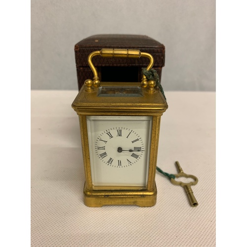 49 - Minature Victorian carriage clock with travel case. In working order, comes with original key. See P... 