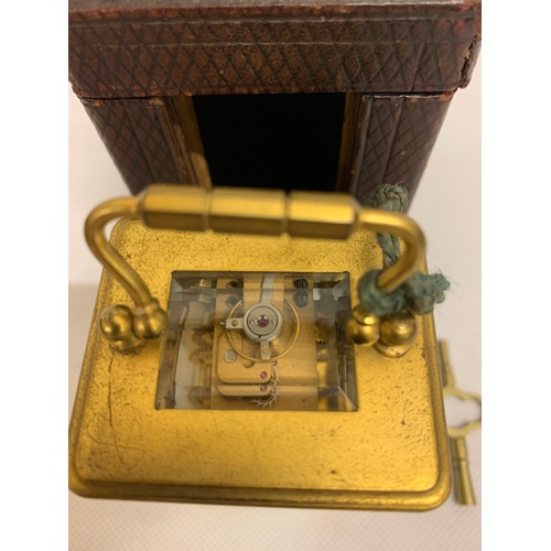 49 - Minature Victorian carriage clock with travel case. In working order, comes with original key. See P... 