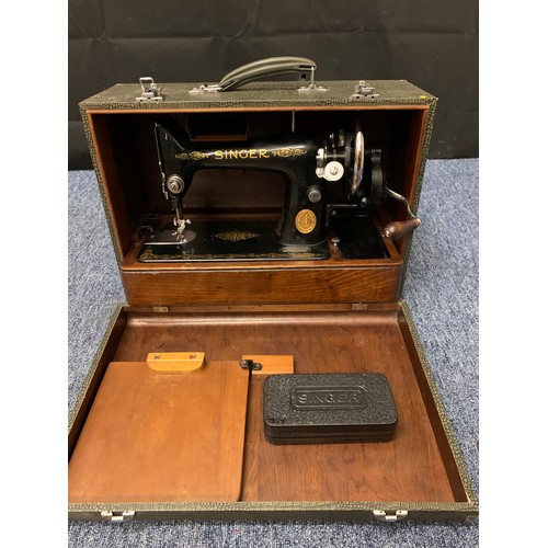 98 - Vintage Singer sewing machine in carry case.