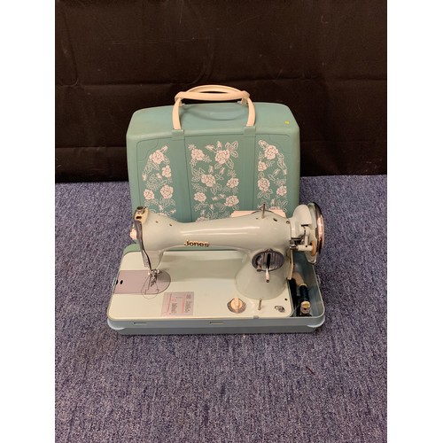 99 - Vintage Jones sewing machine in carry case.