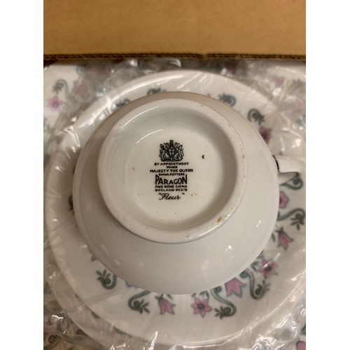 103 - 21 piece Paragon tea set in fleur pattern still in original box.